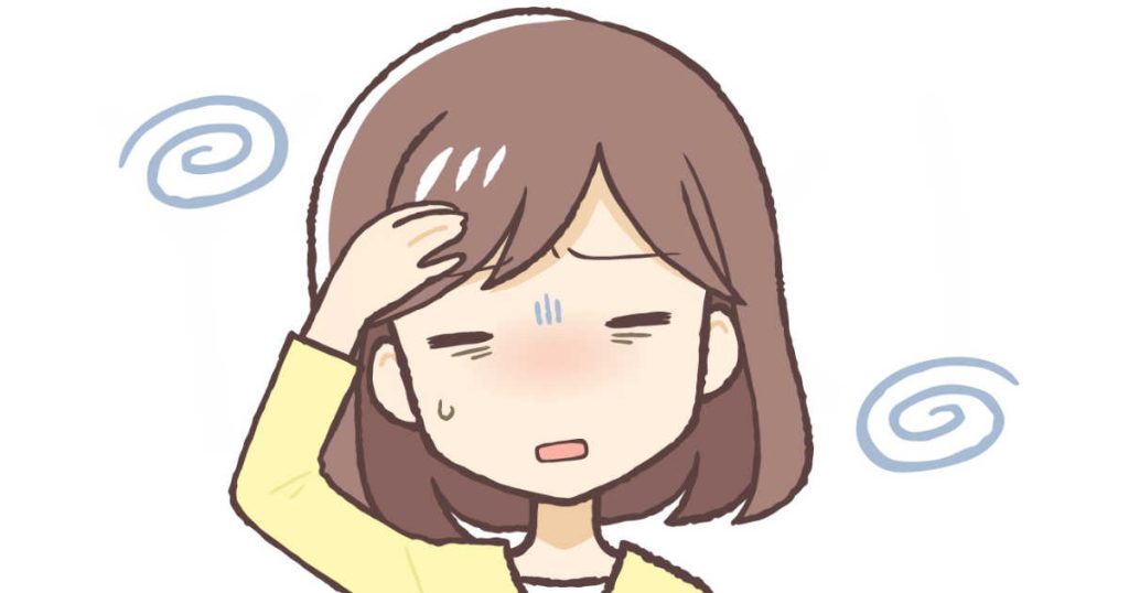 病気で調子が悪い女性の画像。